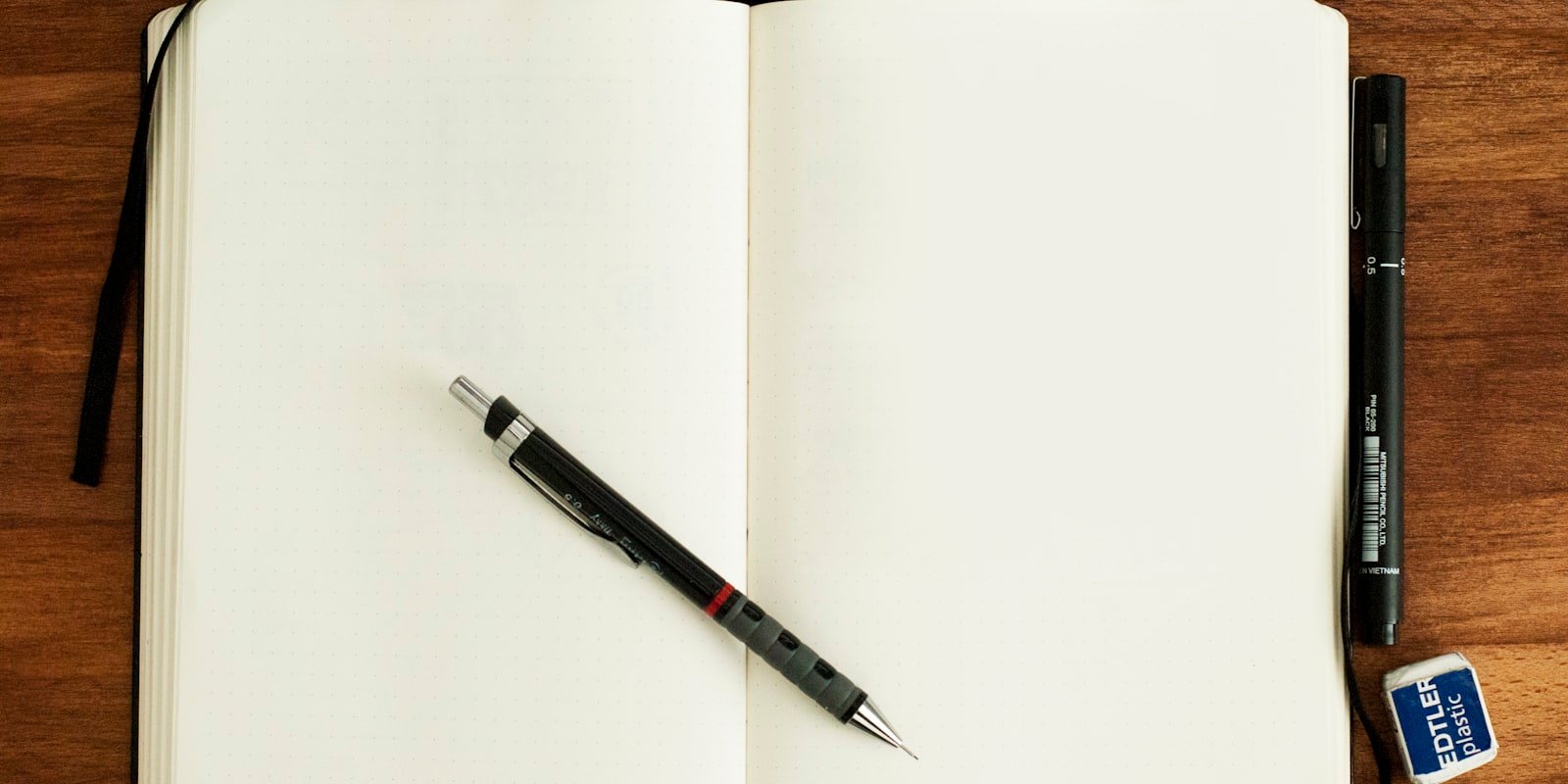 Engineer's notebook with handwritten notes and sketches